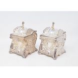 A pair of tea caddies, with Rococo style decoration, 13 cm high (2) Modern