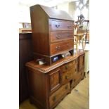 An Arts and Crafts sideboard, 156 cm wide, a bureau, an Ercol chair and two other chairs (5)