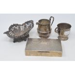 A pierced silver bon bon dish, Sheffield 1899, and a silver cream jug, approx. 11.9 ozt, a Danish
