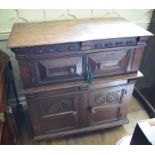 An 18th century oak chest, in two parts, having two pairs of panel doors, 103 cm wide