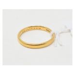 A 22ct gold wedding band, approx. ring size Q, approx. 3.2 g