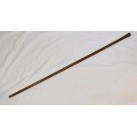 A walking cane, with silver coloured metal piquÃ© style inlaid decoration, slight loss