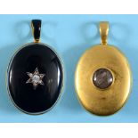 A Victorian yellow coloured metal and agate locket, the suspension with black enamel decoration, the