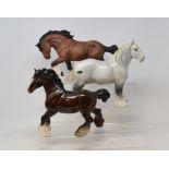 A Beswick Shire Mare, grey, 818, another, brown, a Cantering Shire, grey, 975, another, brown, all