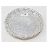 An 18th century style silver waiter, engraved an armorial and foliage, London 1900, approx. 9.2 ozt,