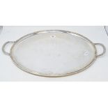 A Christofle silver plated oval tray, with two handles, 63 cm wide