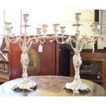 A pair of plated rococo style five light candelabra, 48 cm high (2) Report by RB Modern