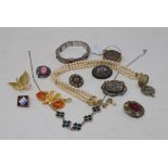 Two mosaic brooches, assorted costume jewellery and watches