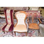 A 19th century kitchen wheelback armchair, a Victorian walnut prie dieu chair, and another chair (3)