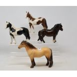 A Beswick Highland Pony, dun, 1644, a Woolly Shetland Mare, brown, 1033, a Pinto Pony, 2nd
