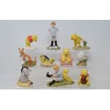 Ten Royal Doulton Winnie-the-Pooh figures, including Christopher Robin, WP9, and Tigger Signs The