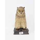 A painted bronze owl perched on a hinged book, 26.5 cm high Report by GH Modern reproduction