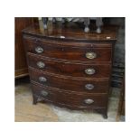 A 19th century mahogany bow front chest of four drawers, with brushing slide, on bracket feet, 94 cm