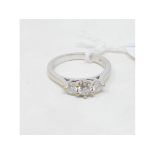 A 9ct white gold and three stone diamond ring, approx. ring size J Report by NG It is approx. 2.9