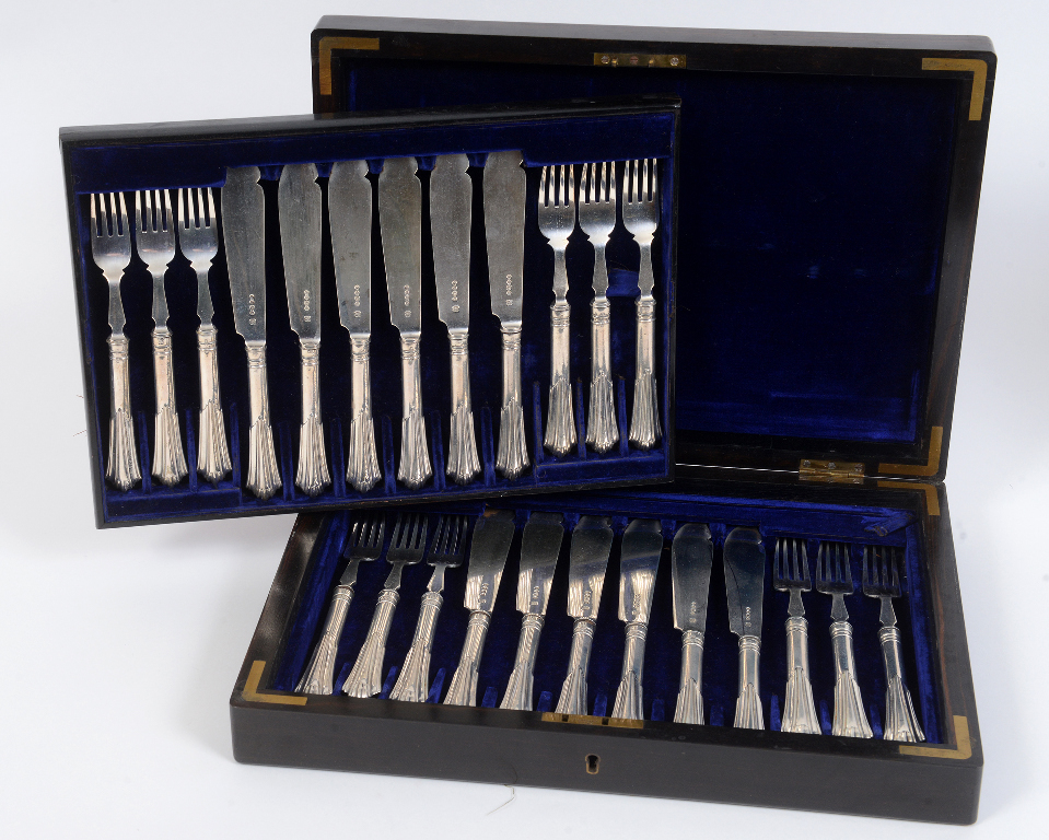 A set of silver fish knives and forks, for twelve place settings, London 1889, in a coromandel