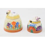 A Clarice Cliff Crocus pattern honey pot and cover, 9.5 cm high, and another, Gayday, 7.5 cm high (