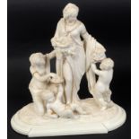 A Worcester Parian porcelain group, of a figure and attendant and two putti, with gilt and painted