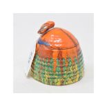 A Clarice Cliff Bizarre Delecia honey pot and cover, with printed mark to base, 7.5 cm high Report