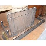 A brass and steel fire surround, 155 cm wide, and other fireside items (5)