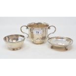 A silver two handled bowl, marks rubbed, 8 cm high, and two other silver bowls, approx. 14.9 ozt (3)
