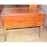 An early 19th century mahogany Pembroke table, in the manner of Gillows, on tapering reeded legs,