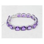 A silver and amethyst bracelet Report by NG Modern
