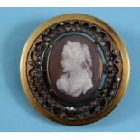 A hardstone cameo brooch, in a diamond set mount See front cover colour illustration Report by NG