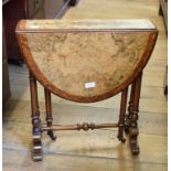 A late Victorian burr walnut and amboyna Sutherland table, on turned supports, 72 cm wide Report