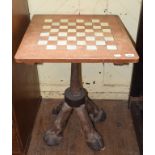 A chess table, with ivory inlay, on zebra legs, 54.5 cm wide