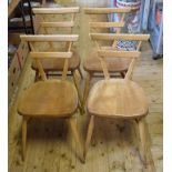 A set of four Ercol beech and elm stacking kitchen chairs (4) Report by GH These are full size