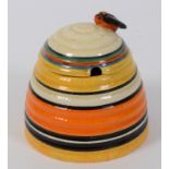 A Clarice Cliff Bizarre Fantasque Liberty pattern honey pot and cover, with printed mark to base,