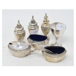 A silver egg cup, Sheffield 1897, and assorted silver condiments, approx. 7.9 ozt