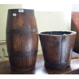A stick stand, in the form of a coopered barrel, 54 cm high, and a leather bin (2)