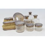 A silver mounted part dressing table set, engraved Amore, including scent bottles, some damage,