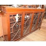 An early 20th century mahogany bookcase, having two pairs of bar glazed doors, 168 cm wide