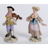 A pair of Meissen porcelain figures, musicians, slight loss, the lady 13.5 cm high (2) See