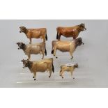 A Beswick Jersey Bull, 1422, another, restored, two Jersey Cows, 1345, another, restored, and a