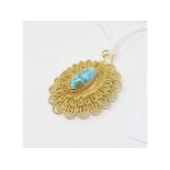 An 18ct gold filigree pendant, set a turquoise cabochon Report by NG Approx. 14.2 g (all in)