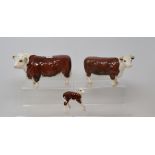 A Beswick Hereford Bull, 1363A, a Hereford Cow 1360, and a Hereford Calf, 1406B, all gloss (3)