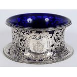 A Continental silver coloured metal potato/dish ring, crested and with an amorial, decorated
