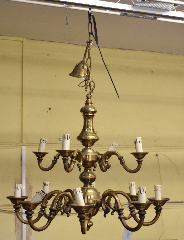 A brass twelve light chandelier, 72 cm wide