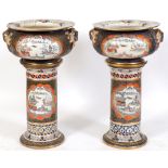 A large pair of Mason's Ironstone jardinieres on stands, decorated Eastern scenes, damages, 55 cm