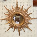 A giltwood sunburst mirror, 50 cm diameter