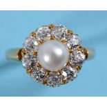 An 18ct gold, cultured pearl and diamond flowerhead ring, approx. ring size K See illustration