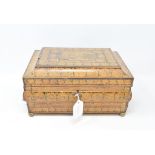 A Regency penwork box, with floral decoration, slight loss and rubbing, 29 cm wide Report by RB