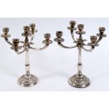 A pair of Italian five light silver coloured metal candelabra, with reeded and fluted columns, 31 cm