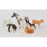 A Beswick Shire Mare, grey, 818, two others, brown, a Foal, large, head down, grey, 947, a Appaloosa