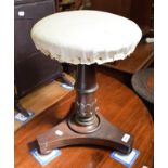 An early Victorian rosewood piano stool, with revolving top