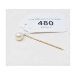 A 9ct gold and cultured pearl stick pin Report by NG Approx. 1.2 g (all in)