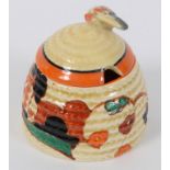 A Clarice Cliff Bizarre Fantasque Farmhouse pattern honey pot and cover, with pinside printed mark